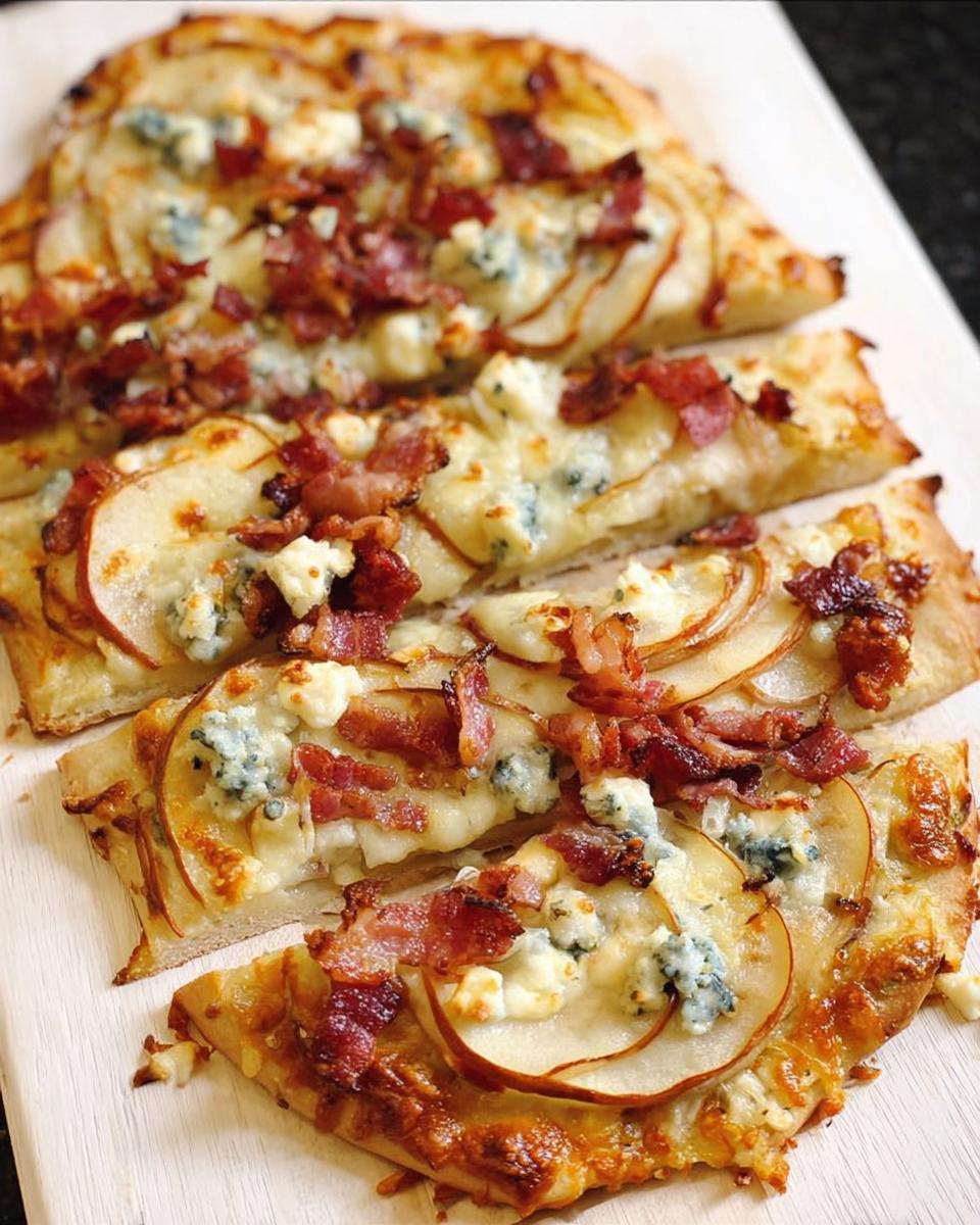 Close-up of a pear and bacon flatbread pizza, a delicious option for 10-Ingredient Pizza Night Recipes.