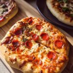 Close-up of a freshly baked pepperoni pizza, part of The Ultimate Pizza Night Recipes Guide for Beginners.