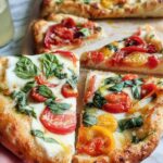 Close-up of fresh tomato and basil pizza slices, perfect for pizza night recipes.